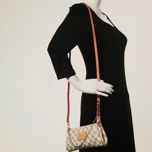 Authentic Louis Vuitton eva clutch